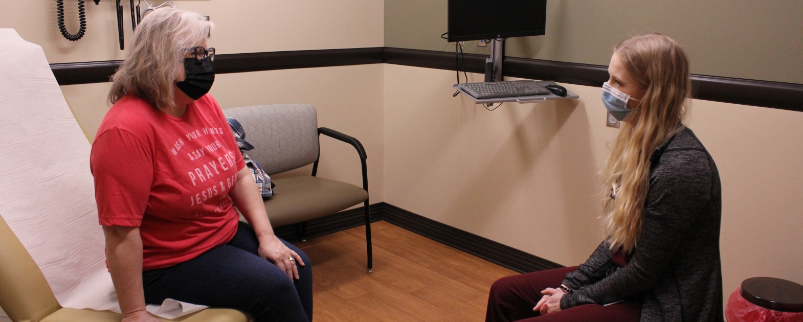 dr peterson smiling with patient