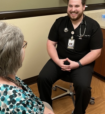 Kam and Patient talking